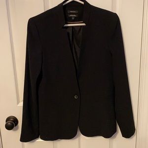 Twist on your classic black blazer